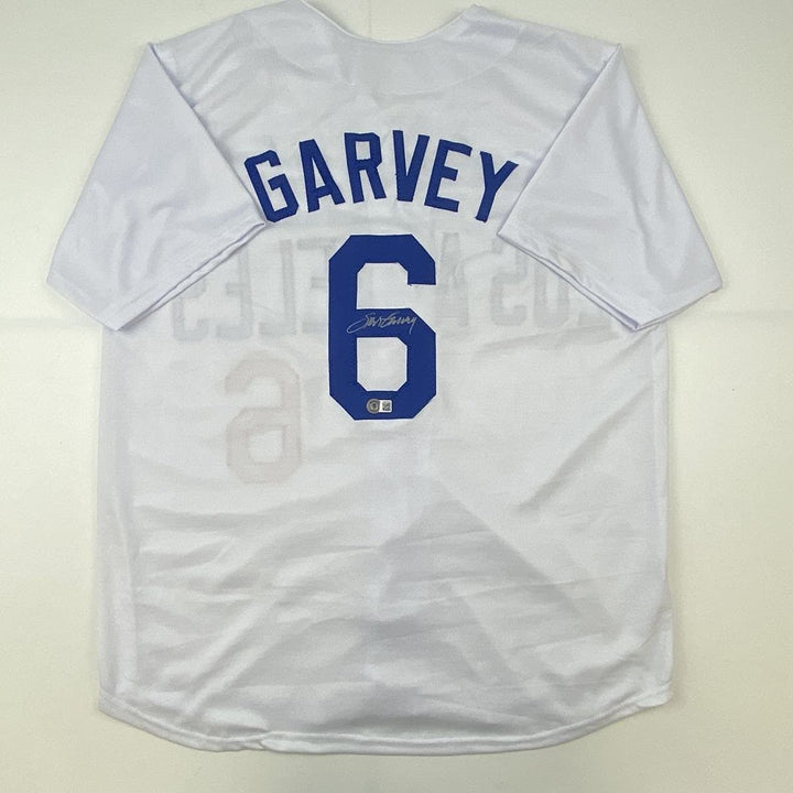 Autographed/Signed STEVE GARVEY Los Angeles White Jersey Beckett COA