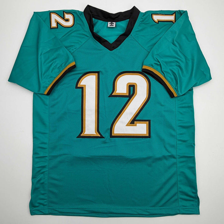 Autographed/Signed Travis Hunter Jacksonville Teal Retro Jersey Beckett BAS COA