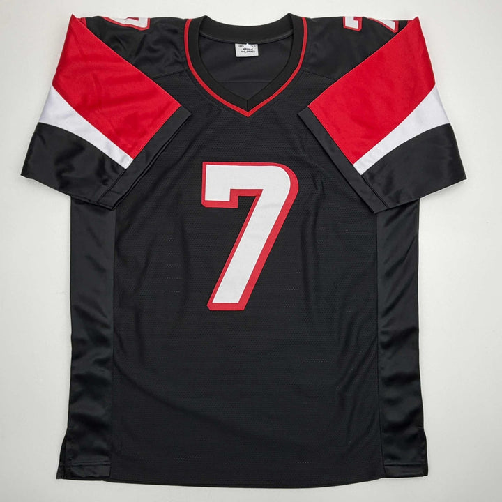 Autographed/Signed MICHAEL MIKE VICK Atlanta Black Jersey PSA/DNA COA