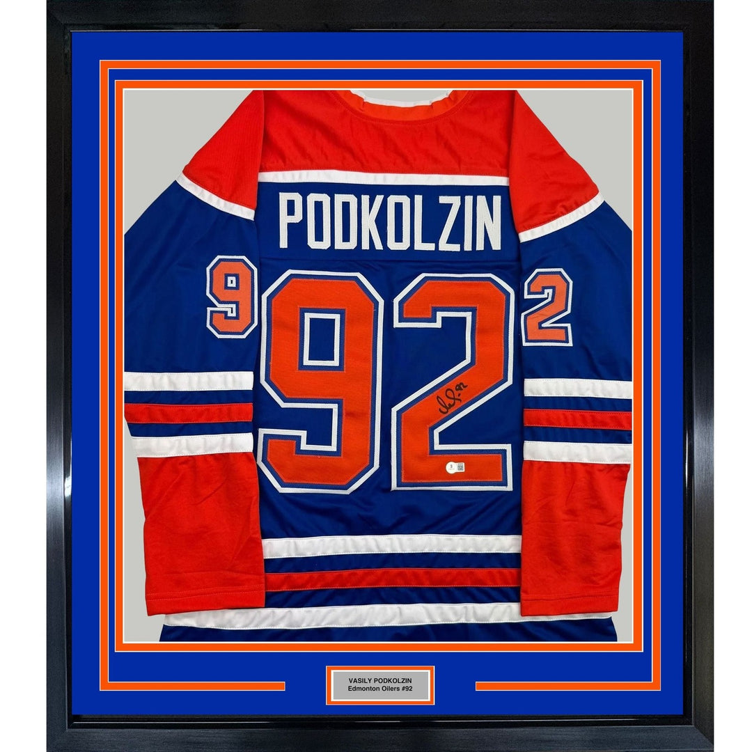 Framed Signed Vasily Podkolzin 35x39 Edmonton Blue Jersey Beckett BAS COA