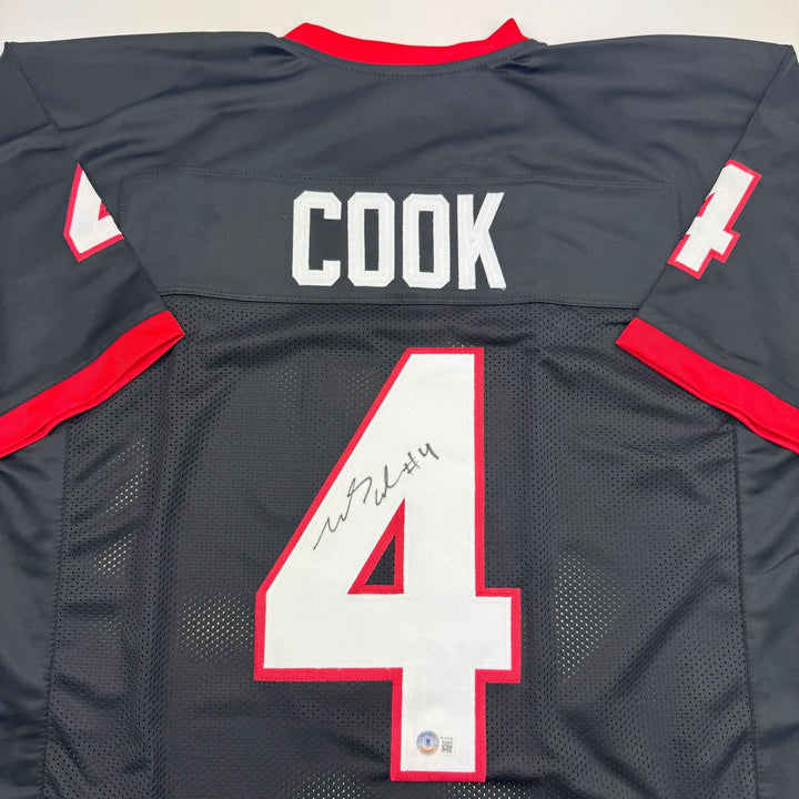 Autographed/Signed James Cook Georgia Black College Jersey Beckett BAS COA