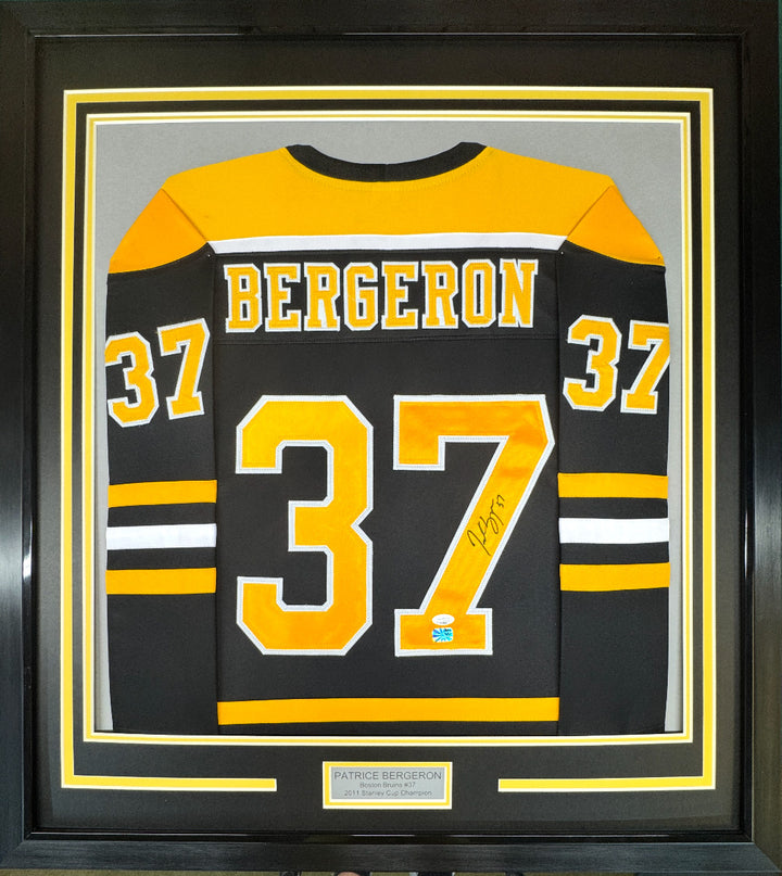 Framed Autographed/Signed Patrice Bergeron 33x42 Boston Black Jersey PSA/DNA COA