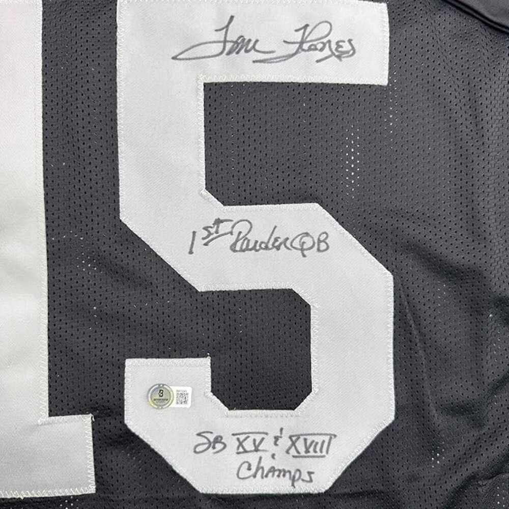 Framed Autographed/Signed Tom Flores 35x39 Oakland Black Jersey Beckett BAS COA