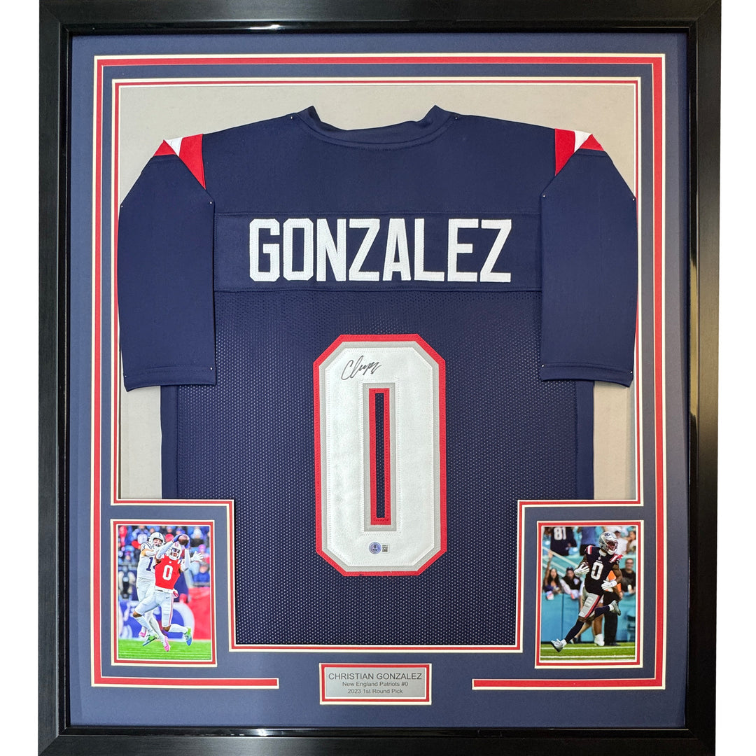 Framed Autographed/Signed Christian Gonzalez 35x39 NE Blue Jersey Beckett COA