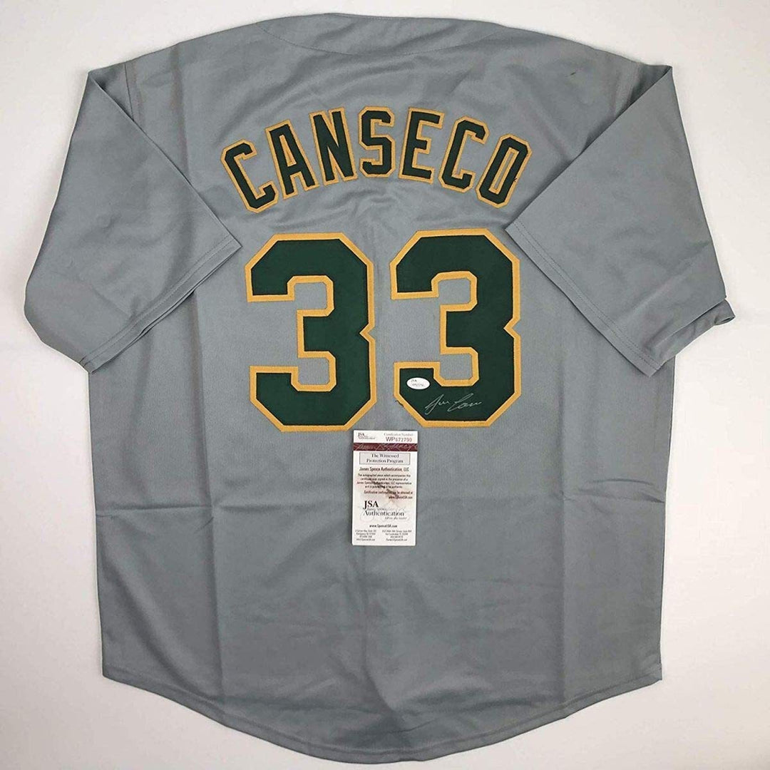 Autographed/Signed JOSE CANSECO Oakland Grey Baseball Jersey JSA COA Auto