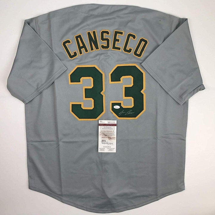 Autographed/Signed JOSE CANSECO Oakland Grey Baseball Jersey JSA COA Auto