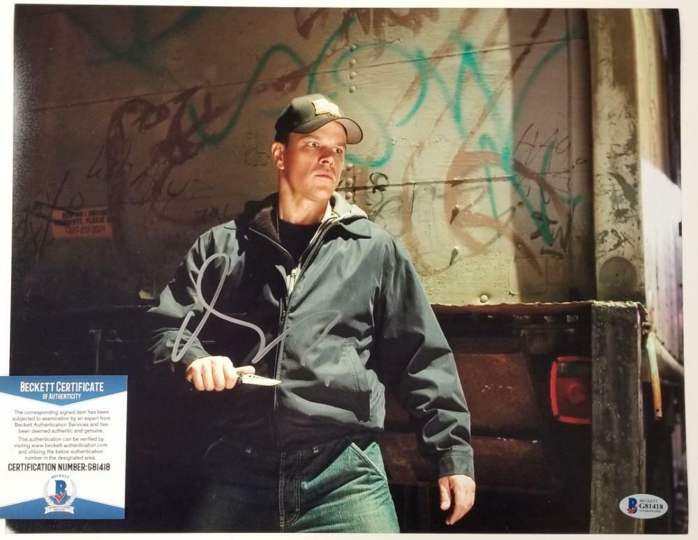 Actor Matt Damon signed Jason Bourne 11x14 Photo autograph A ~ Beckett BAS COA
