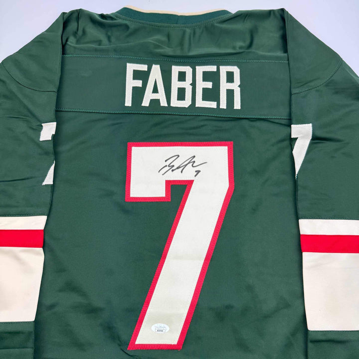 Autographed/Signed Brock Faber Minnesota Green Hockey Jersey JSA COA