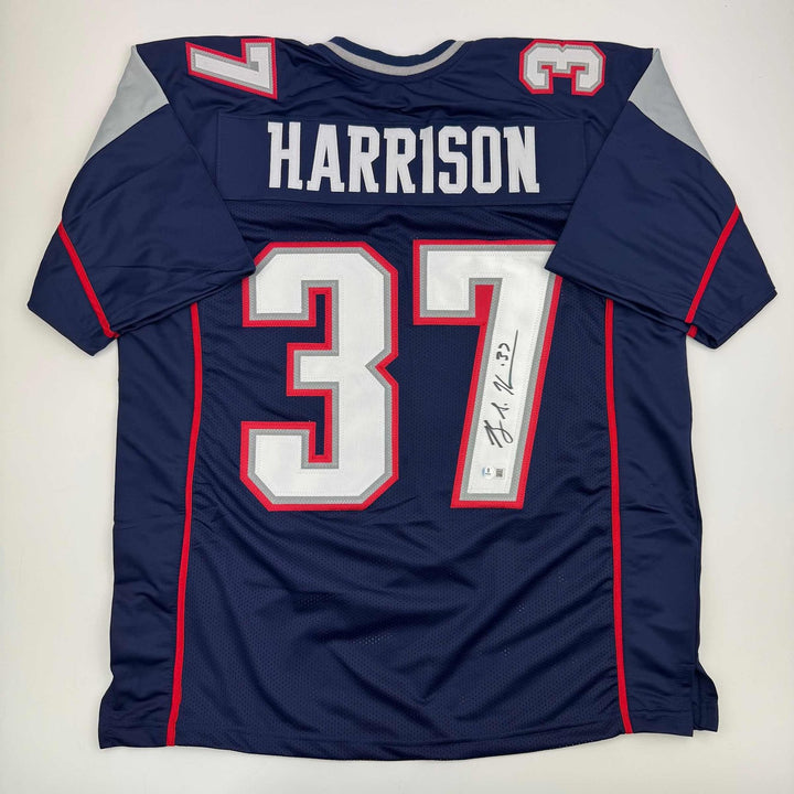 Autographed/Signed Rodney Harrison New England Blue Jersey Beckett COA