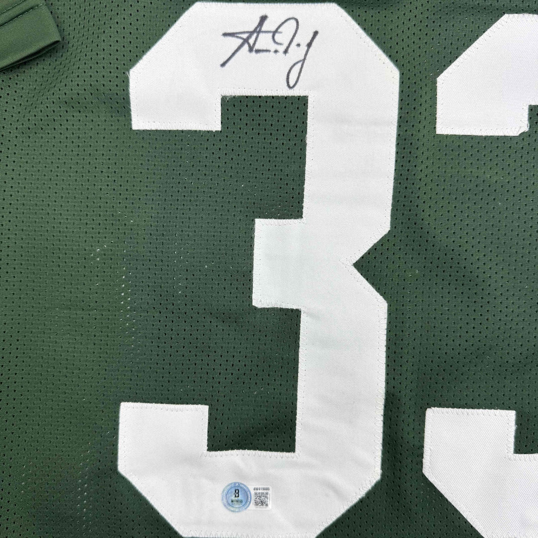Autographed/Signed Aaron Jones Green Bay Green Football Jersey Beckett BAS COA