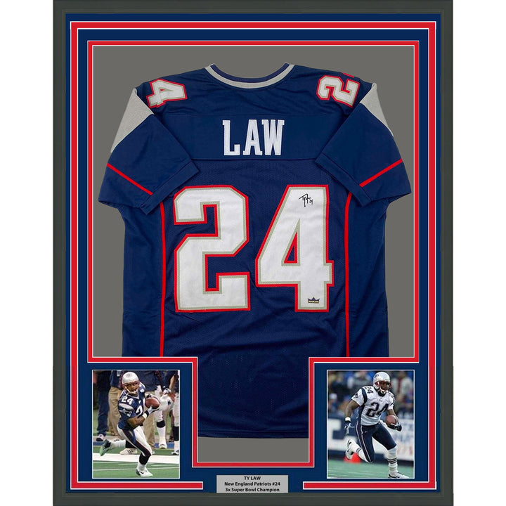 Framed Facsimile Autographed Ty Law 33x42 Blue Reprint Laser Auto Jersey