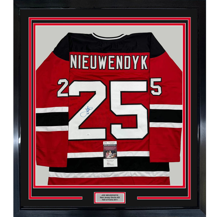Framed Signed Joe Nieuwendyk 35x39 New Jersey Red Jersey JSA COA
