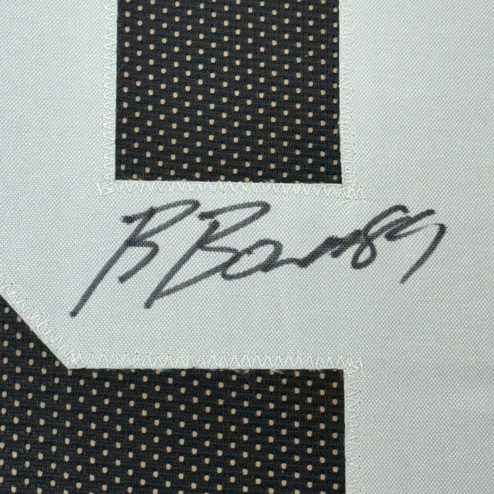 Framed Autographed/Signed Brock Bowers 35x39 Las Vegas Black Jersey BAS COA