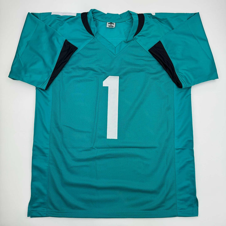 Autographed/Signed Travis Etienne Jr. Jacksonville Teal Jersey Beckett BAS COA
