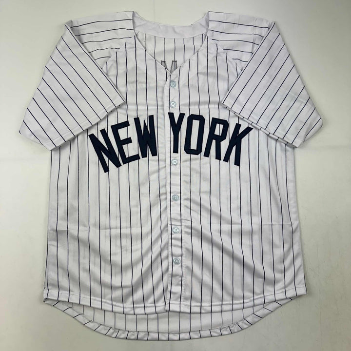Autographed/Signed Johnny Damon New York Pinstripe Jersey Beckett COA