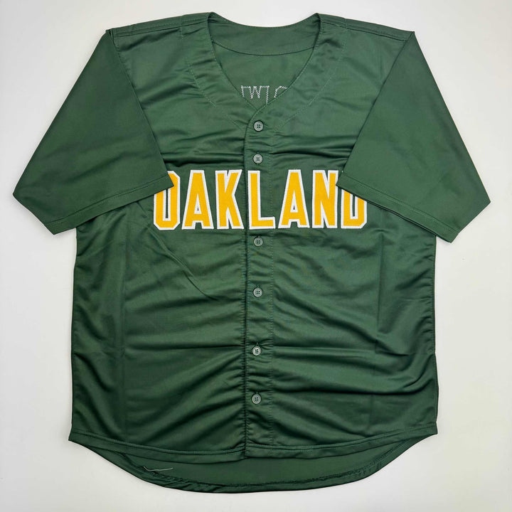Autographed/Signed Mark McGwire Oakland Green Baseball Jersey Beckett BAS COA