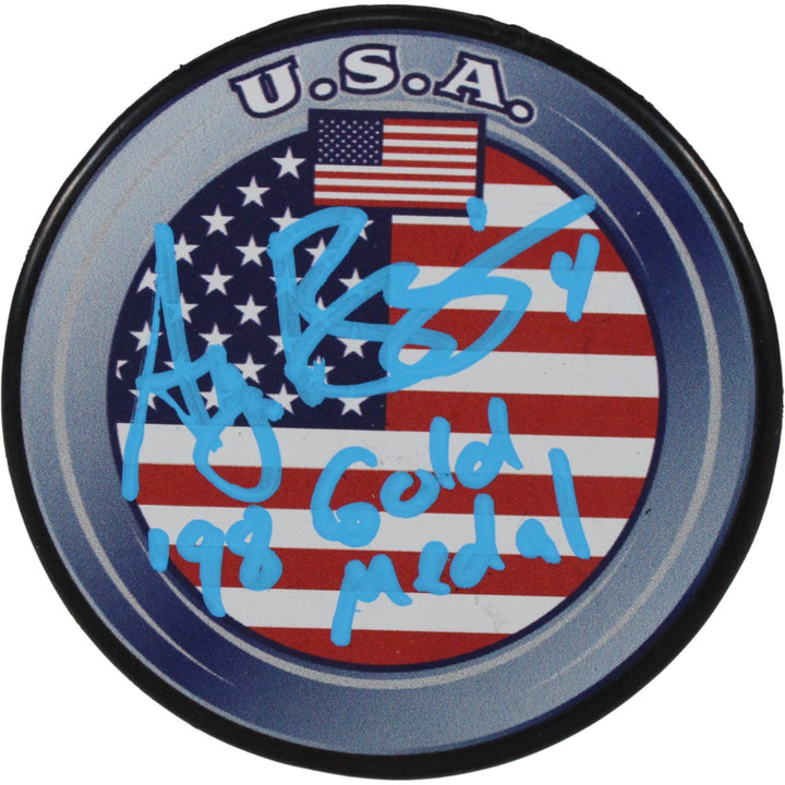 Angela Ruggiero Autographed/Signed USA Logo Puck 98 Gold Medal JSA 53996