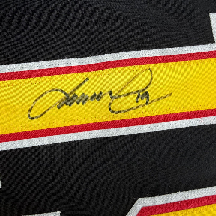 Autographed/Signed Markus Naslund Vancouver Black Hockey Jersey Beckett COA