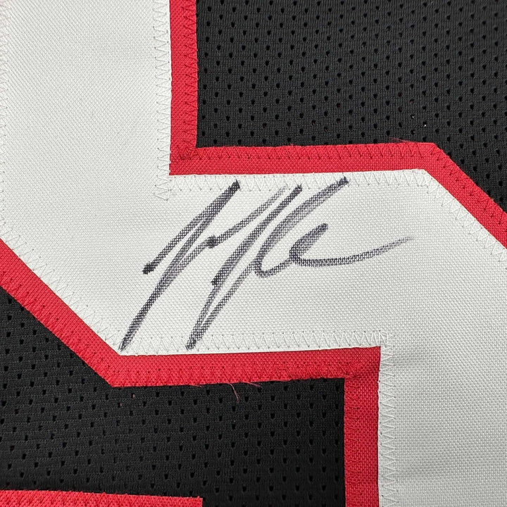 Framed Autographed/Signed Jessie Tuggle 35x39 Atlanta Black Jersey JSA COA