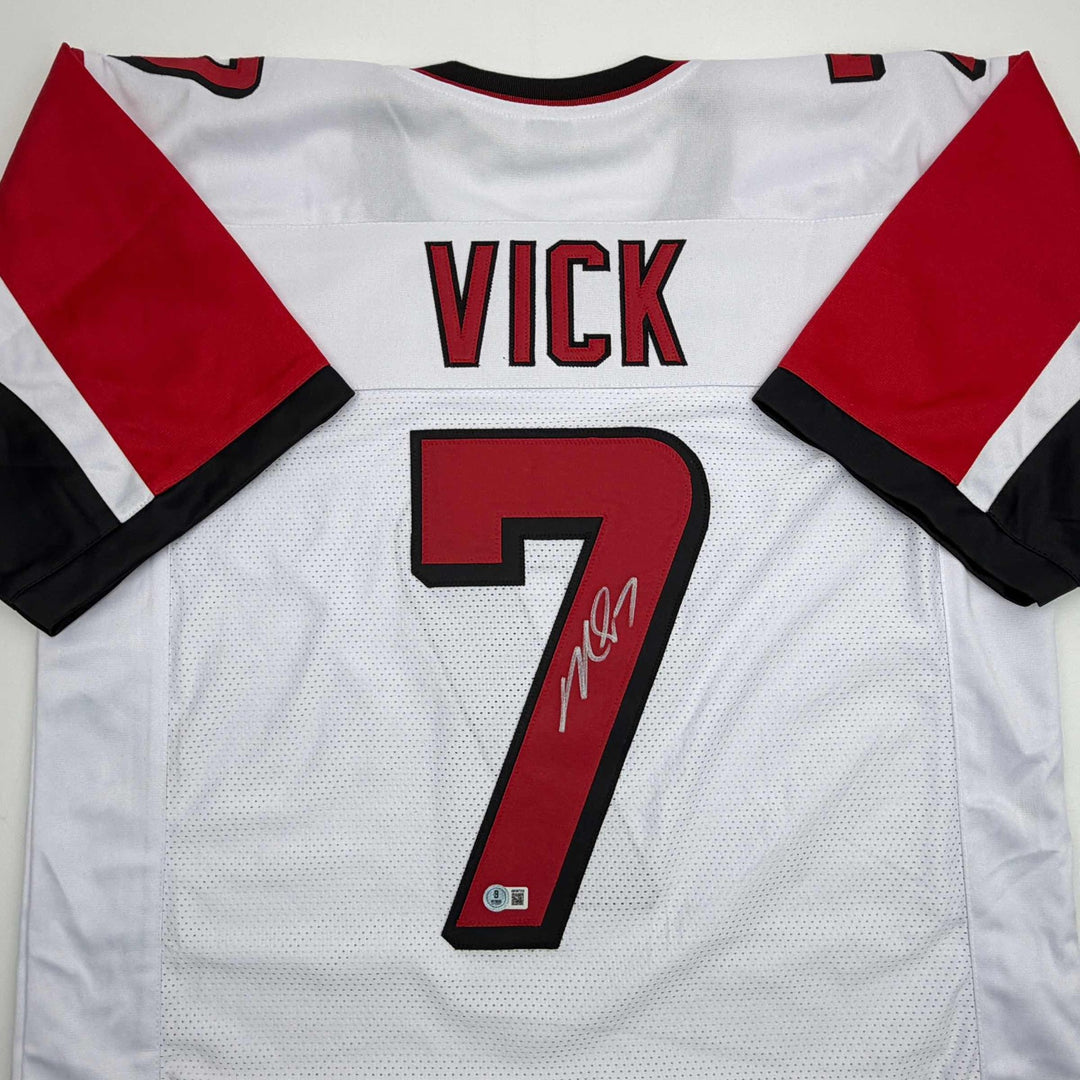 Autographed/Signed MICHAEL MIKE VICK Atlanta White Football Jersey PSA/DNA COA
