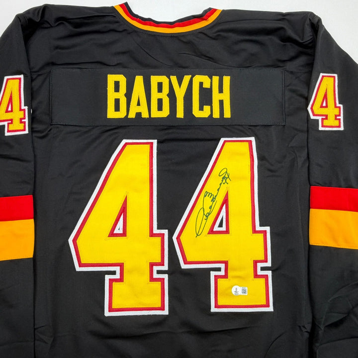 Autographed/Signed Dave Babych Vancouver Black Hockey Jersey Beckett COA
