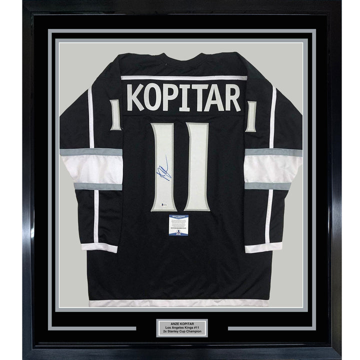 Framed Autographed/Signed Anze Kopitar 35x39 Los Angeles LA Black Jersey JSA COA