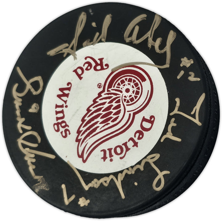 Gordie Howe, Sid Abel, & Ted Lindsay Red Wings Logo Puck Production Auto Beckett