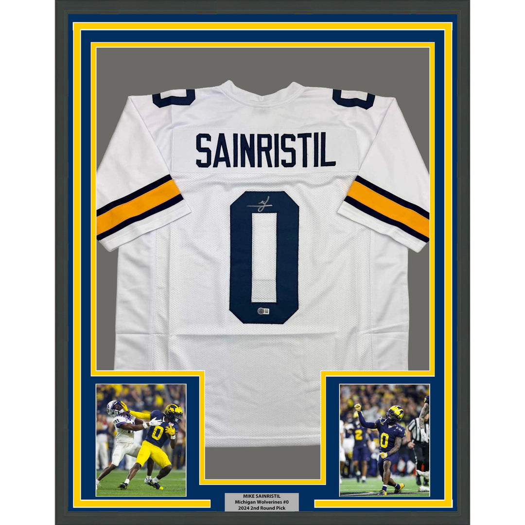 Framed Autographed/Signed Mike Sainristil 35x39 Michigan White Jersey BAS COA