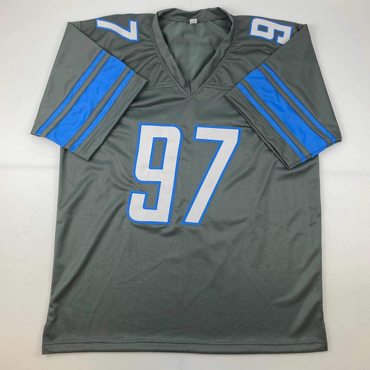 Autographed/Signed Aidan Hutchinson Detroit Grey Football Jersey Beckett BAS COA