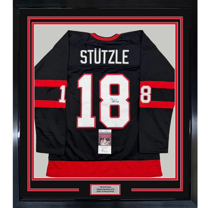 Framed Autographed/Signed Tim Stutzle 35x39 Ottawa Black Jersey JSA COA