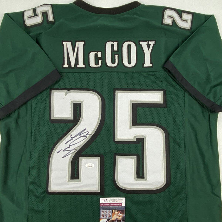 Autographed/Signed LESEAN MCCOY Philadelphia Green Football Jersey JSA COA Auto