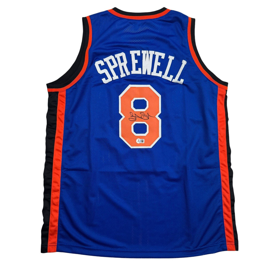 Autographed/Signed Latrell Sprewell New York Blue Basketball Jersey BAS COA