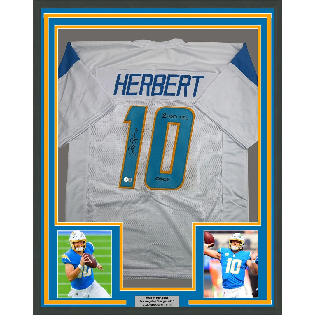 Framed Autographed/Signed Justin Herbert ROY 35x39 White Jersey Beckett COA