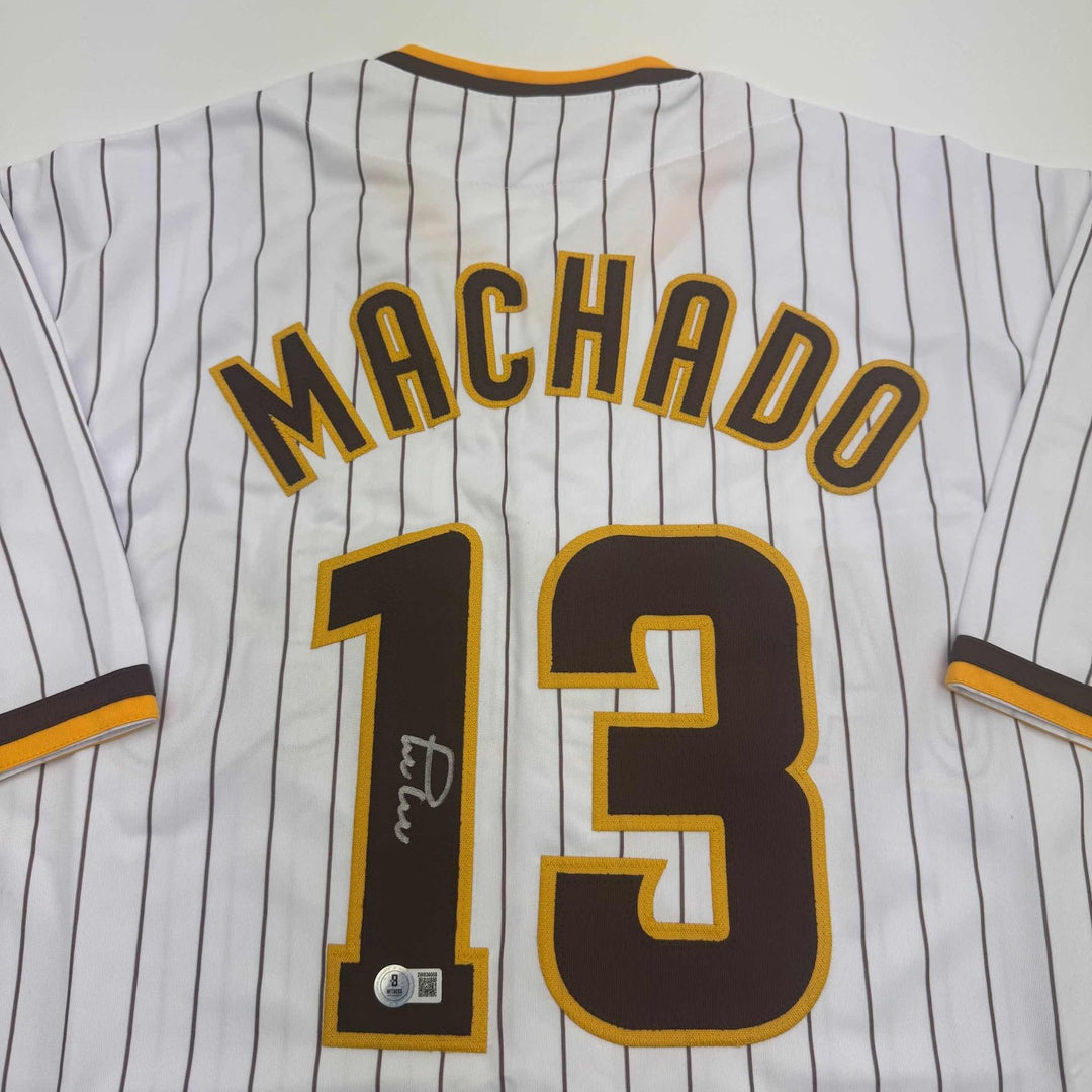 Autographed/Signed MANNY MACHADO San Diego Pinstripe Jersey Beckett COA