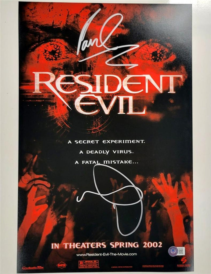 Milla Jovovich & Paul W.S. Anderson signed Resident Evil 12x18 photo (C) ~ BAS