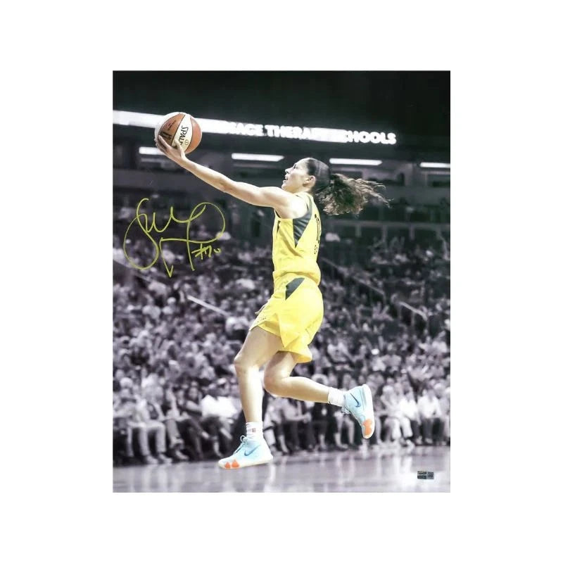 Sue Bird Seattle Storm Autographed 16x20 Spotlight Layup Photograph Signed in Yellow (CX Auth)
