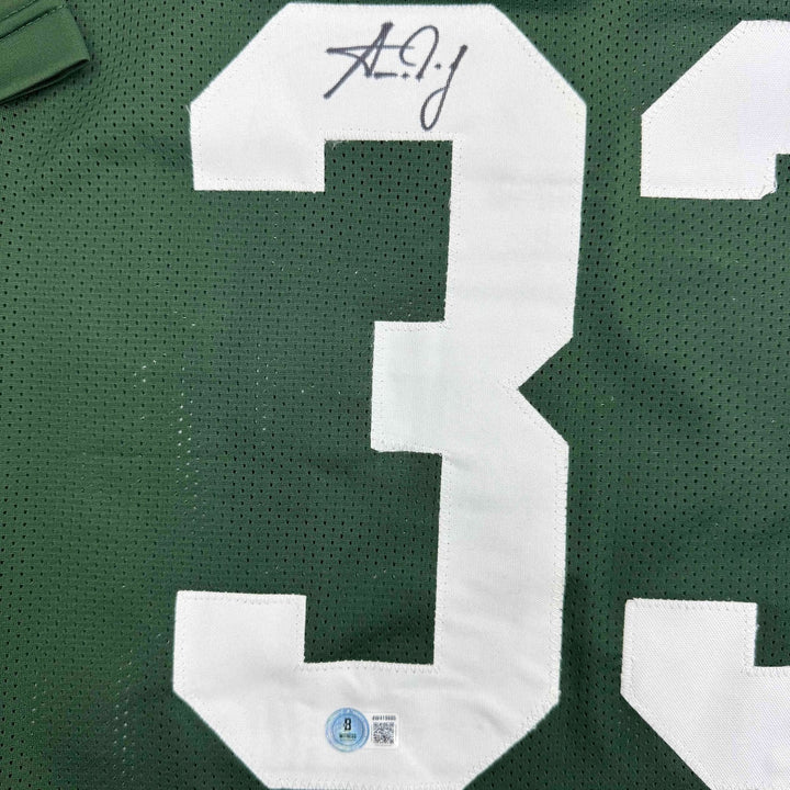 Autographed/Signed Aaron Jones Green Bay Green Jersey Beckett BAS COA