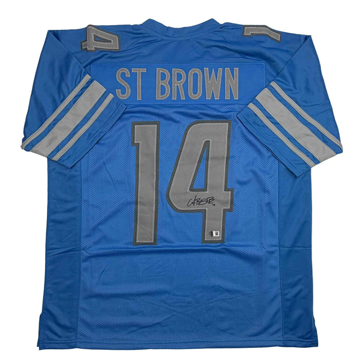 Autographed/Signed Amon-Ra St. Brown Detroit Blue Jersey Beckett BAS COA