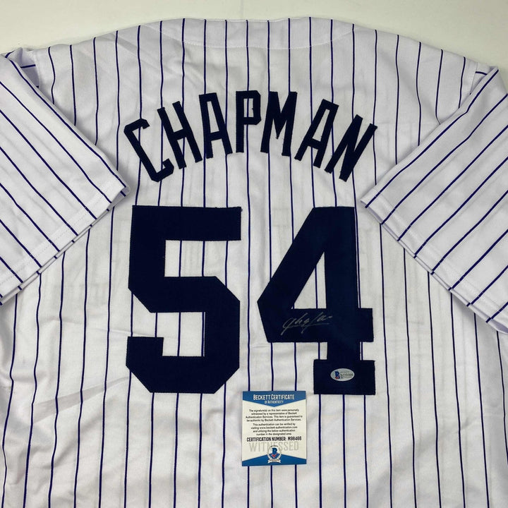 Autographed/Signed Aroldis Chapman New York Pinstripe Jersey Beckett COA