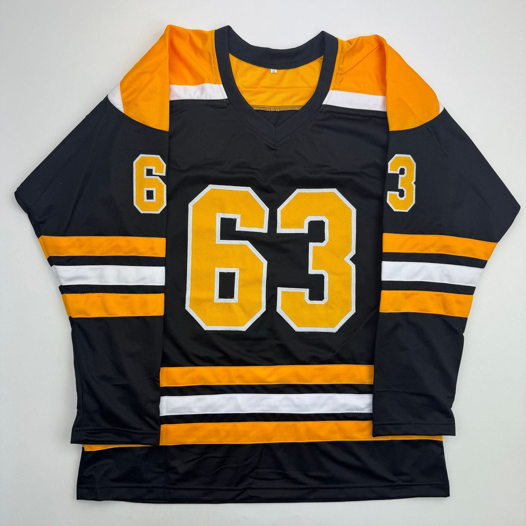 Autographed/Signed Brad Marchand Boston Black Hockey Jersey JSA COA