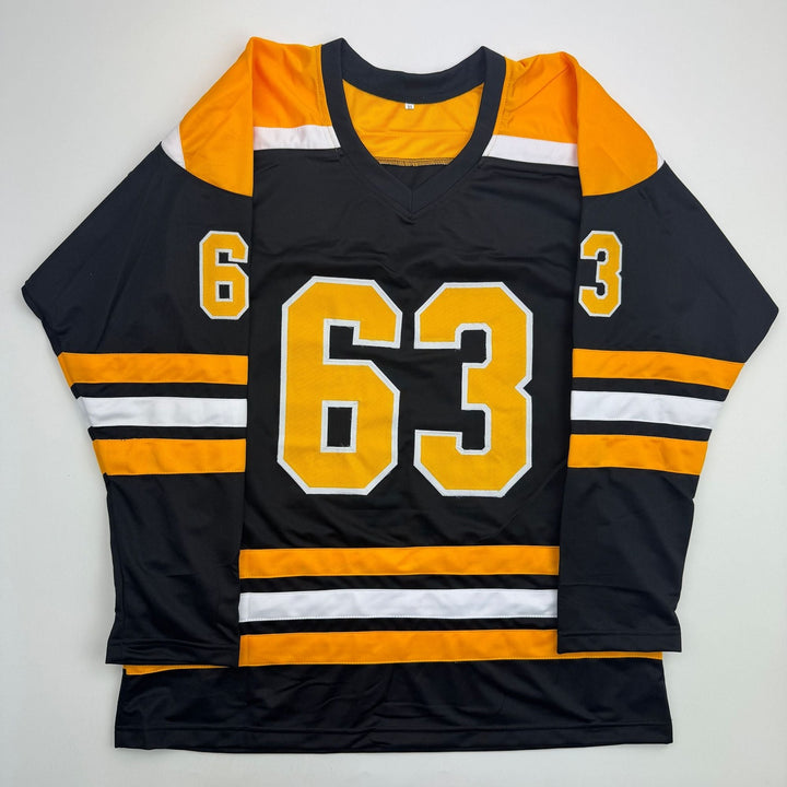 Autographed/Signed Brad Marchand Boston Black Hockey Jersey JSA COA