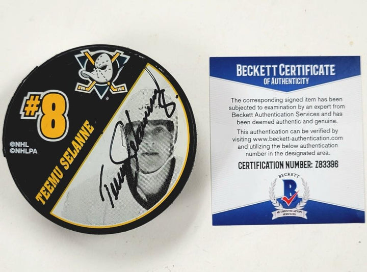 Teemu Selanne & Paul Kariya signed Anaheim Ducks Puck autograph (A) Beckett BAS