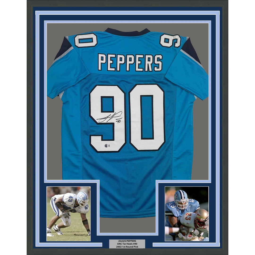 Framed Autographed/Signed Julius Peppers 35x39 Carolina Blue Jersey BAS COA