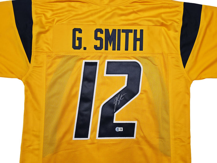 West Virginia Mountaineer Geno Smith Signed Gold Jersey Beckett Witness