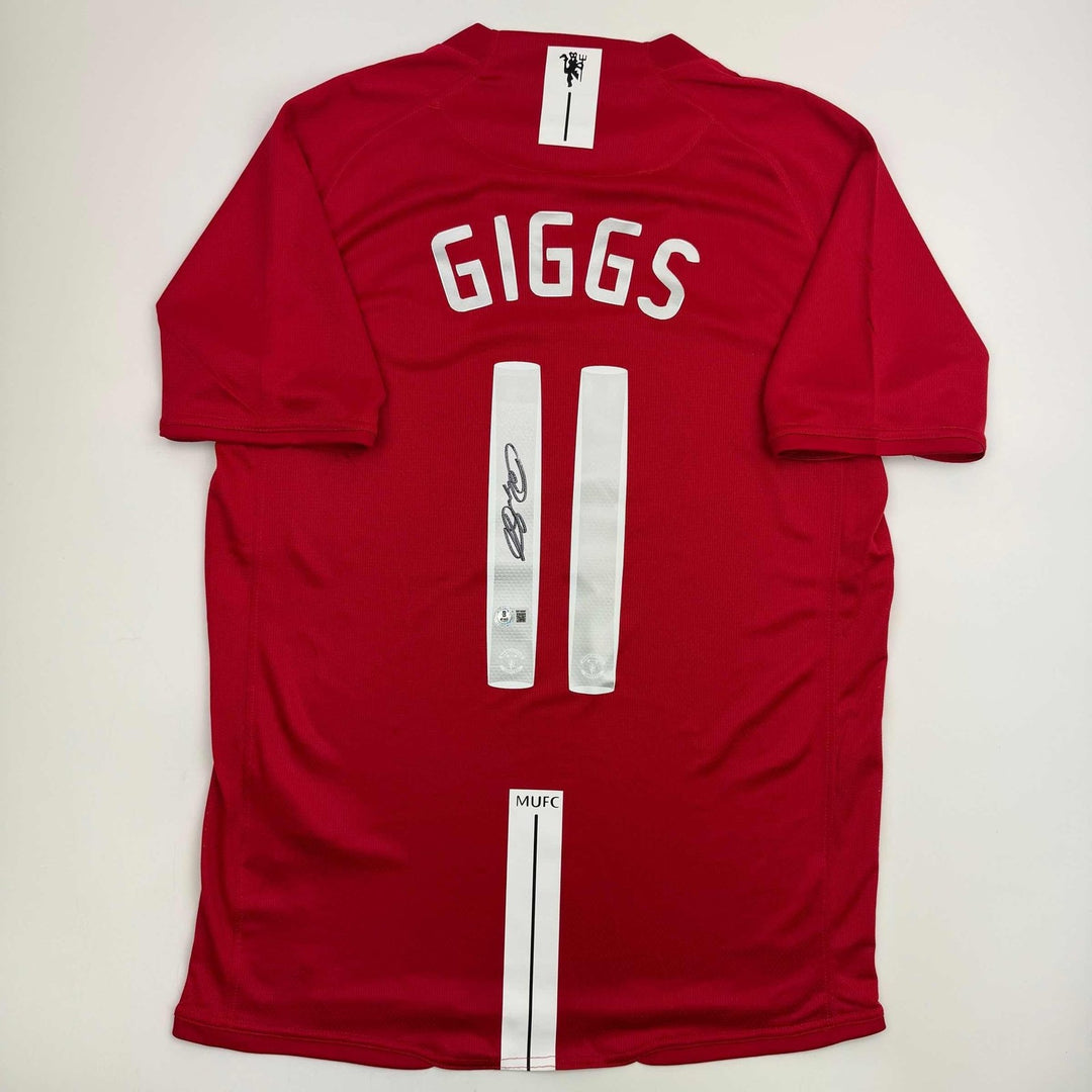 Autographed/Signed Ryan Giggs Manchester United Red Jersey Beckett BAS COA