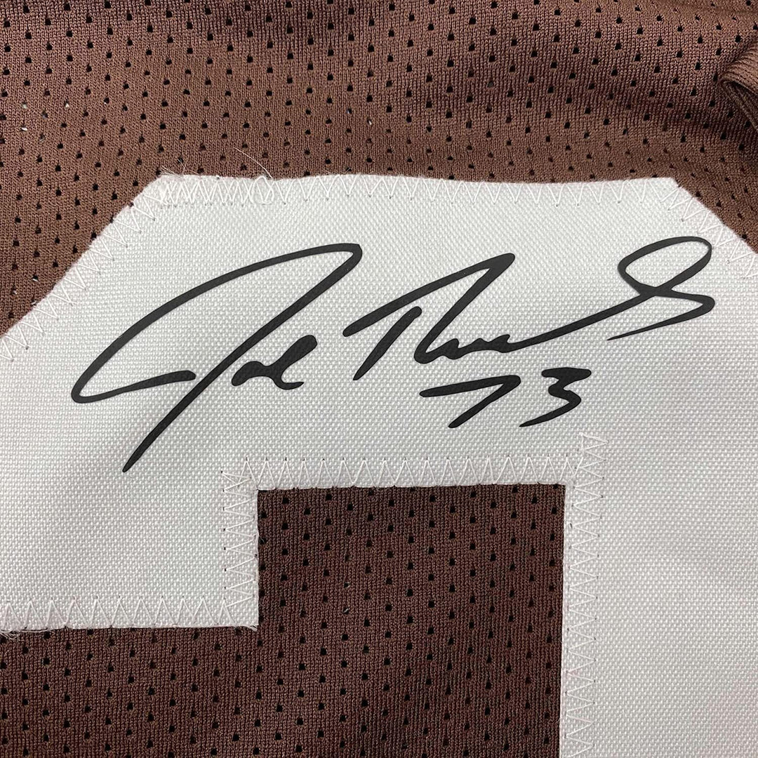 Framed Facsimile Autographed Joe Thomas 33x42 Brown Reprint Laser Auto Jersey