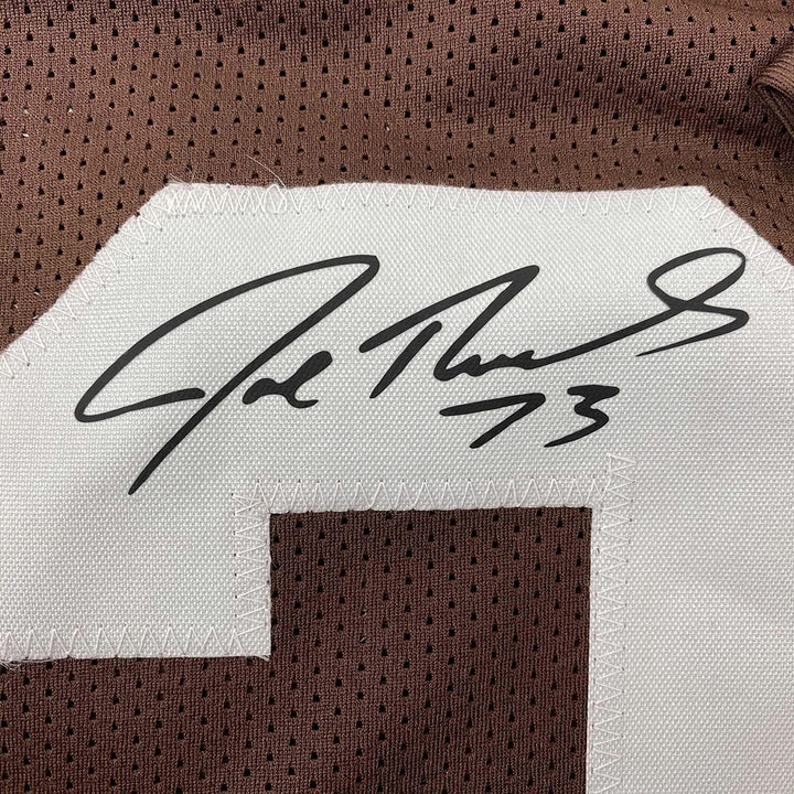 Framed Facsimile Autographed Joe Thomas 33x42 Brown Reprint Laser Auto Jersey