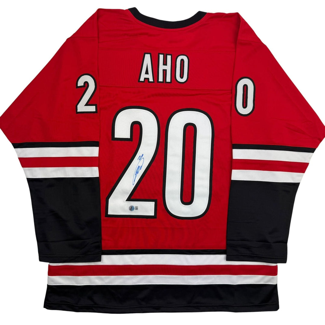 Autographed/Signed Sebastian Aho Carolina Red Hockey Jersey Beckett BAS COA