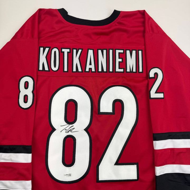 Autographed/Signed Jesperi Kotkaniemi Carolina Red Hockey Jersey BAS COA