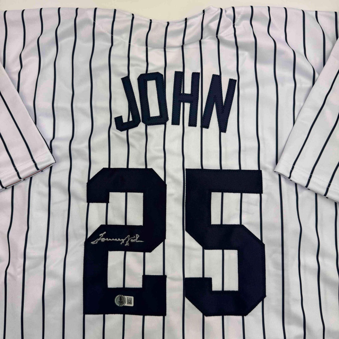Autographed/Signed Tommy John New York Pinstripe Baseball Jersey Beckett BAS COA